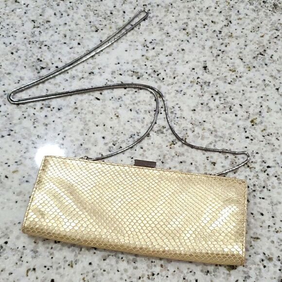 Adrienne Vittadini womans gold leather clutch with cross body strap - Picture 1 of 8